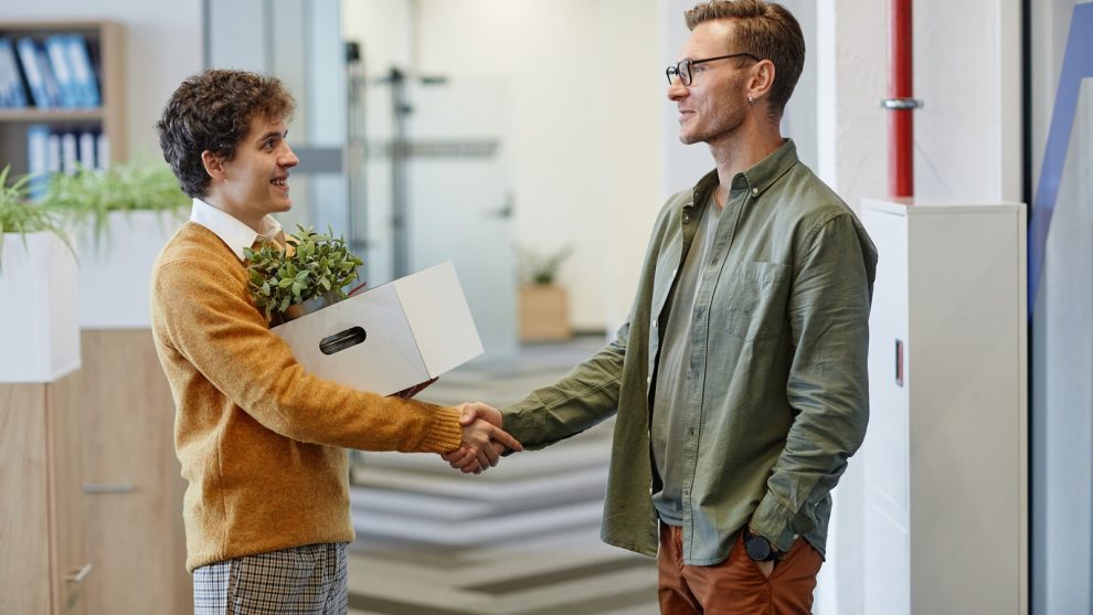 Young Man Meeting Colleague at New Job