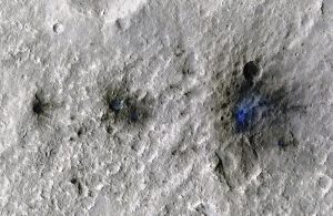 Crater after meteorite impact on Mars